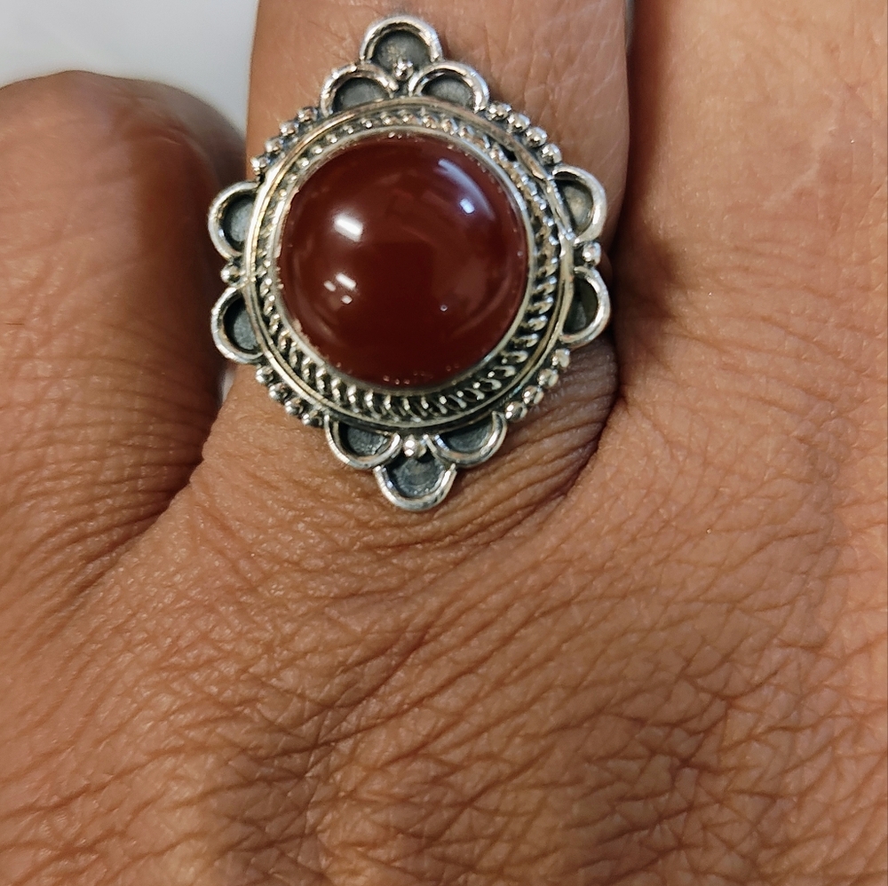 Ornate Brown and Silver Ring with Intricate Design